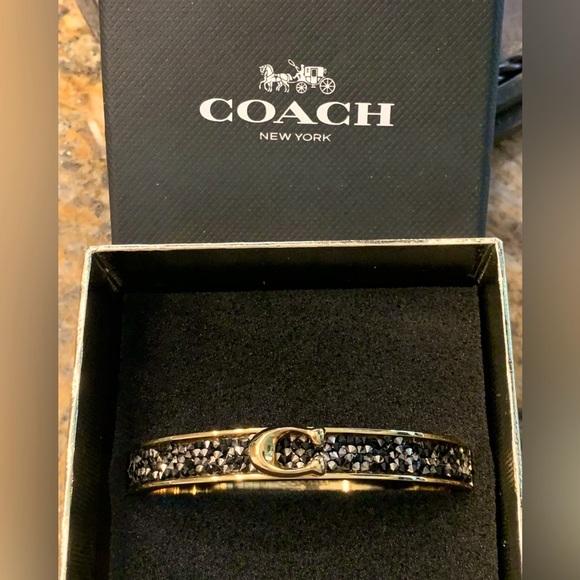 Coach Jewelry - ⭐️💫COACH NEW IN BOX BLACK
CRYSTAL & GOLD
BANGLE STUNNING EYE
CATCHING DESIGN!